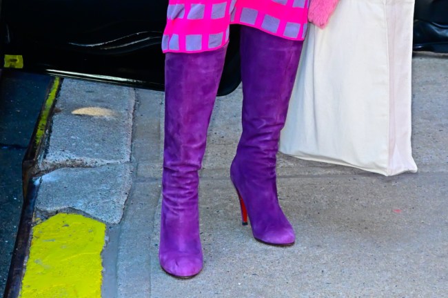 A closer look at Gayle King's purple Christian Louboutin boots worn in New York City on Feb. 18, 2025.